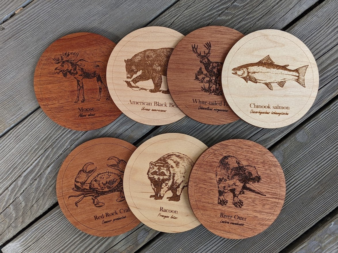 Wooden coasters with animals native to British Columbia